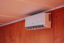 foto de un aire acondicionado dentro del contenedor